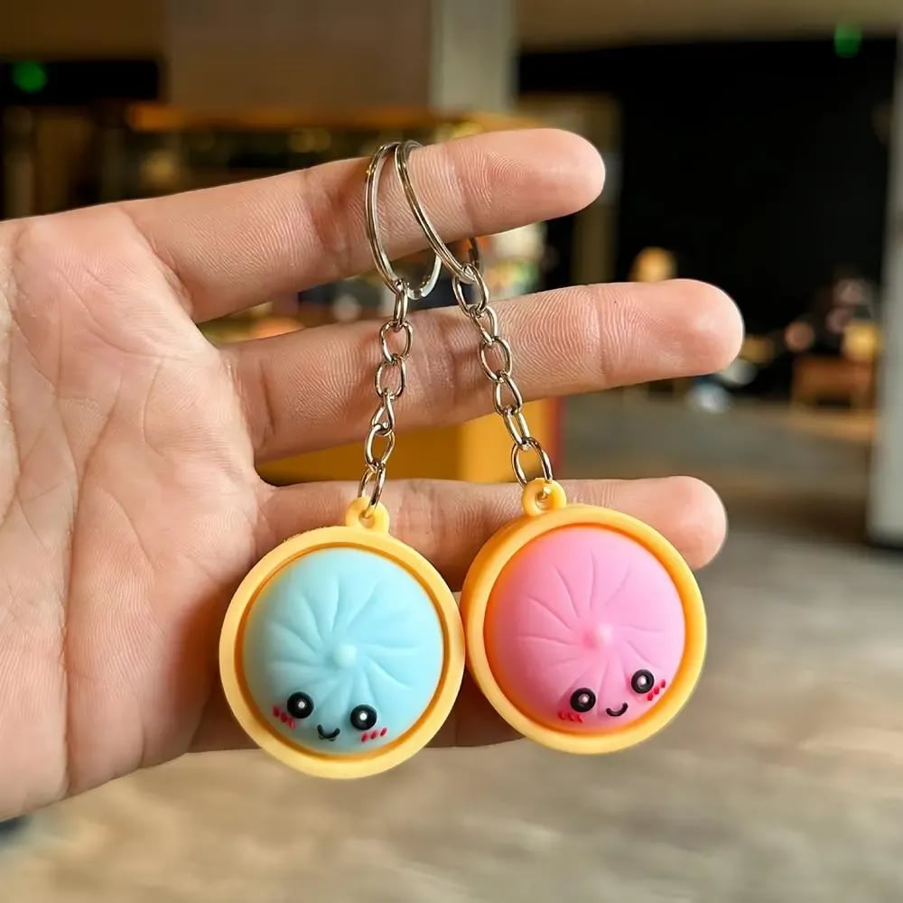 2026 Hot Sale🎀 Cute Dumpling Pressable Fidget Keychain – Adorable Stress Relief Charm