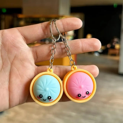 2026 Hot Sale🎀 Cute Dumpling Pressable Fidget Keychain – Adorable Stress Relief Charm