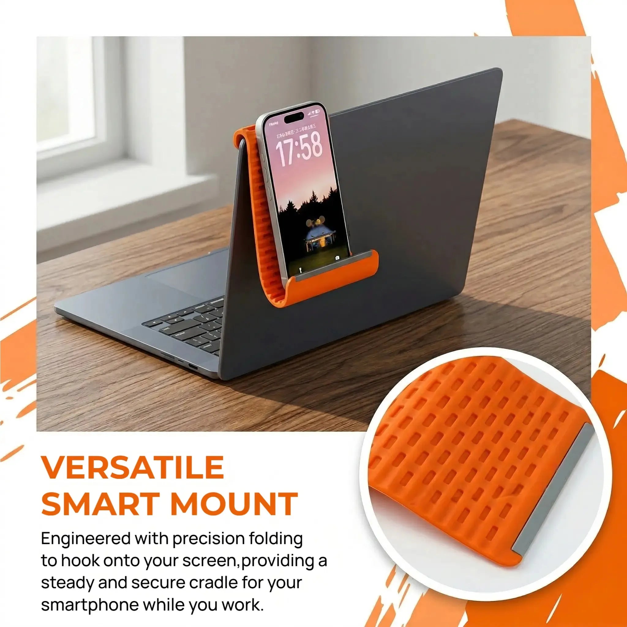 Foldable stand attached to laptop screen supporting smartphone