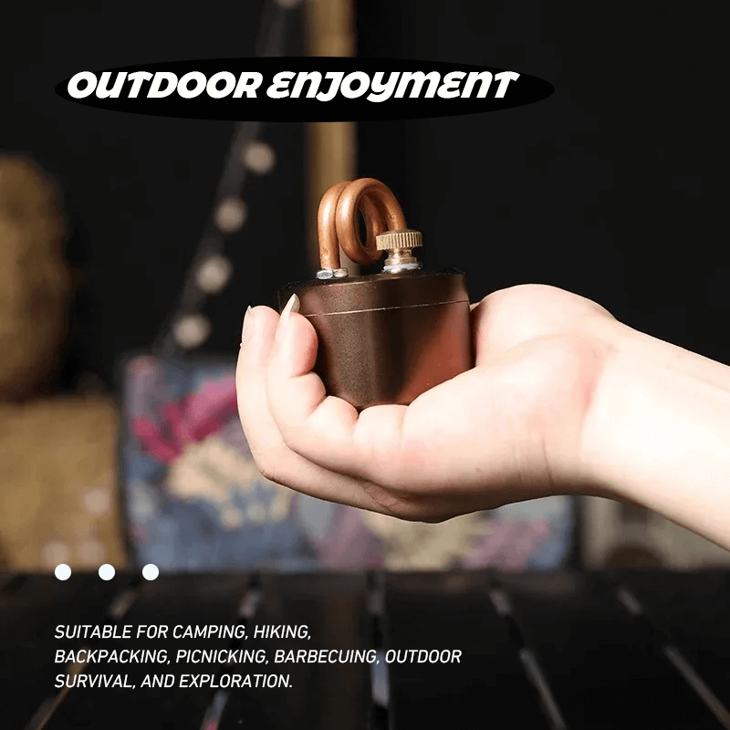 Mini alcohol stove held in one hand