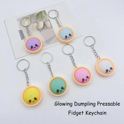 2026 Hot Sale🎀 Cute Dumpling Pressable Fidget Keychain – Adorable Stress Relief Charm